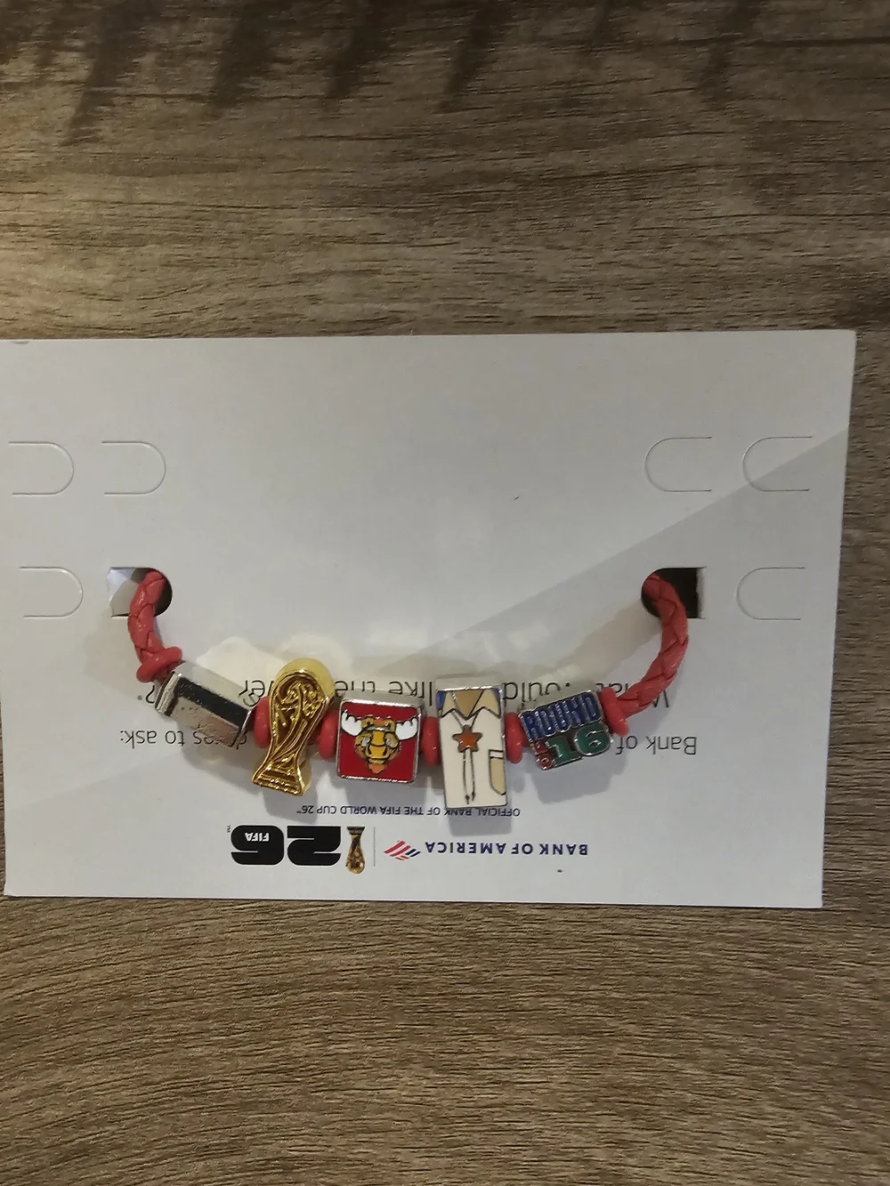 Red Charm Bracelet with Mixed Enamel and Gold-Tone Accents